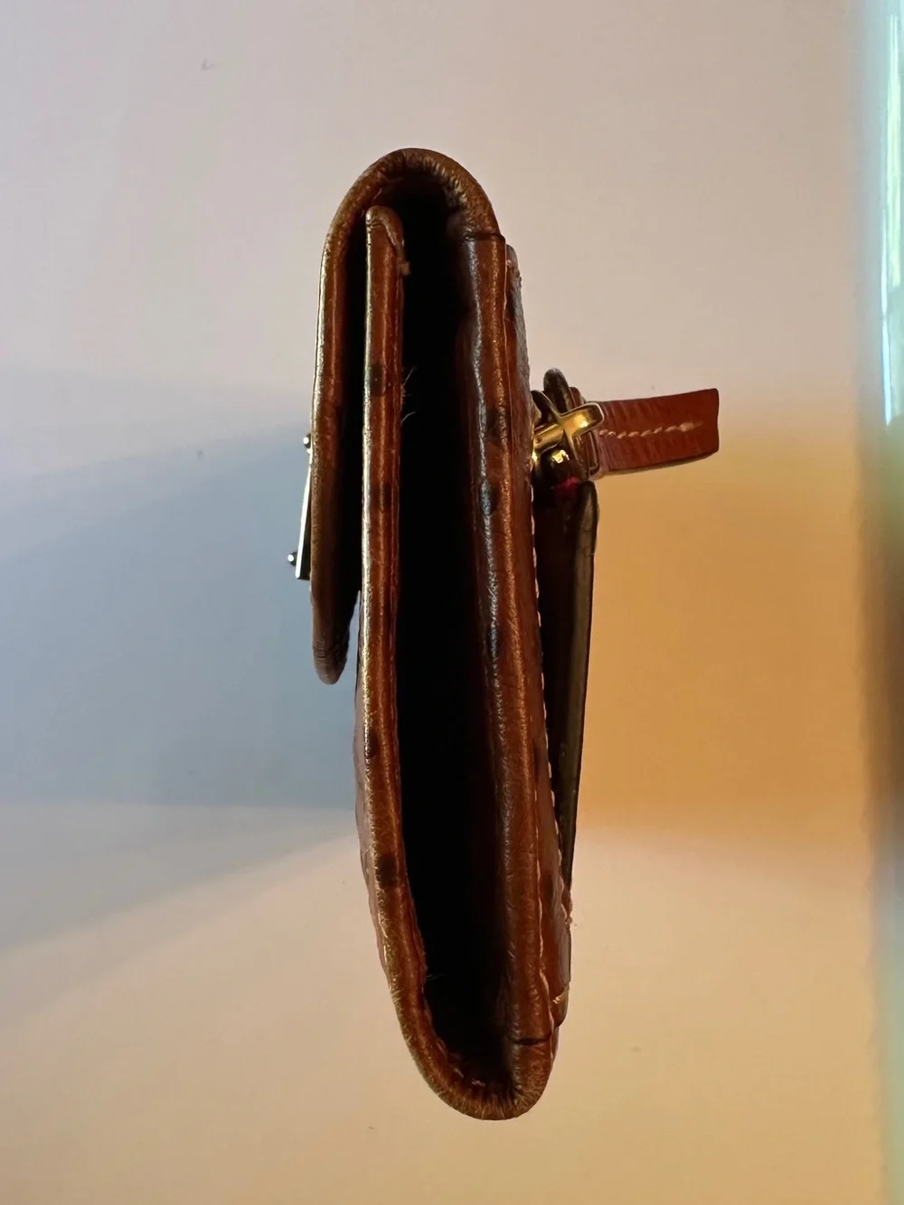 DOONEY & BOURKE CARAMEL/TAN OSTRICH-EMBOSSED CONTINENTAL CLUTCH